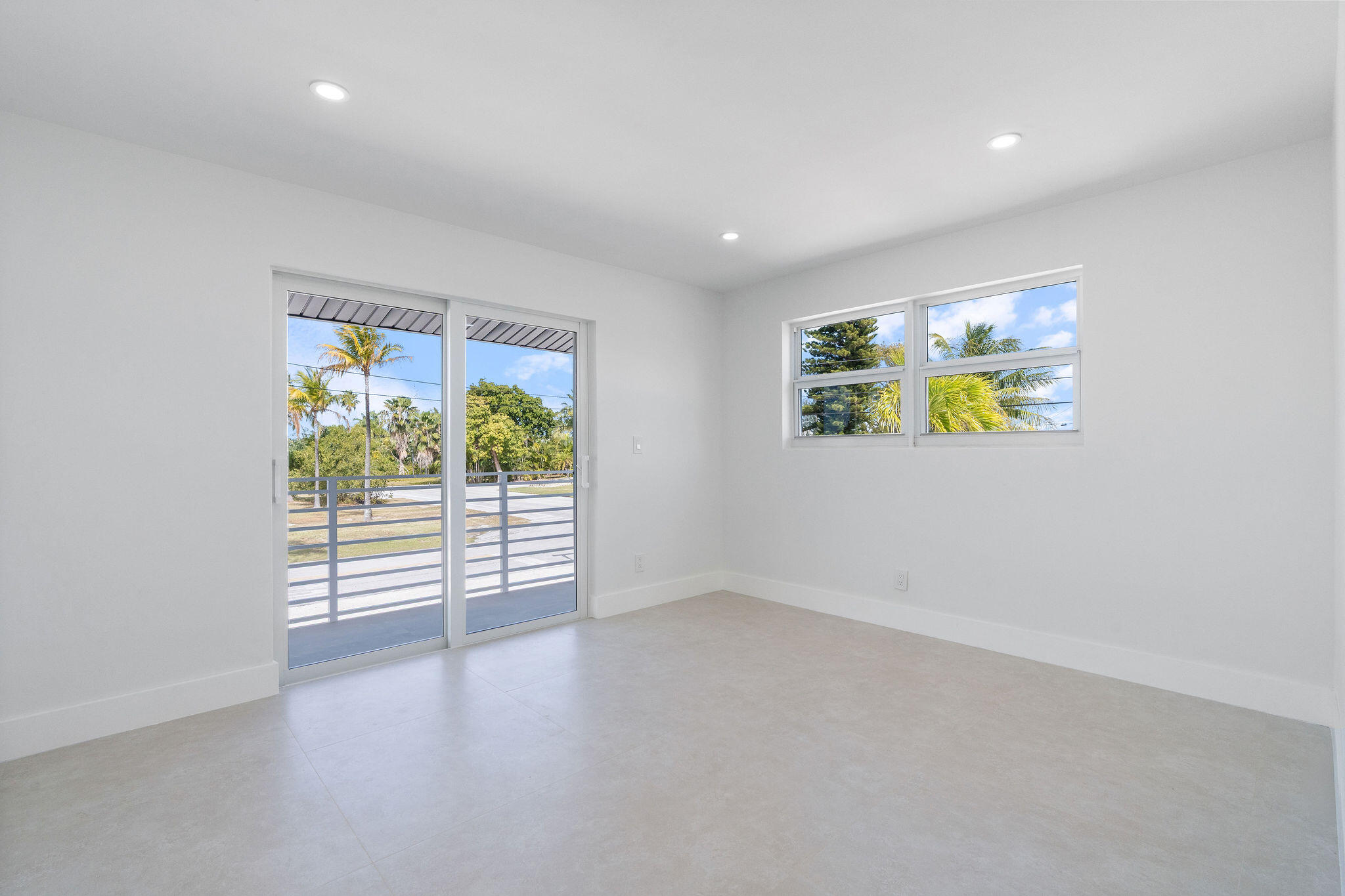 30368 Killdeer Lane Big Pine Key, FL 33043 - Photo 48 of 59 wooden floor in an empty room with a window