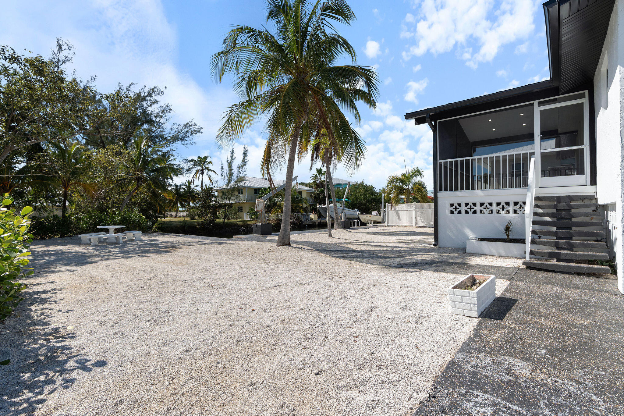 30368 Killdeer Lane Big Pine Key, FL 33043 - Photo 55 of 59 a front view of a house with a yard