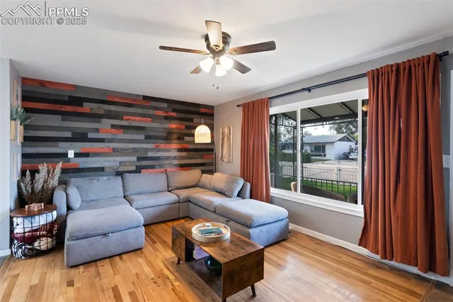 a living room with furniture and a window