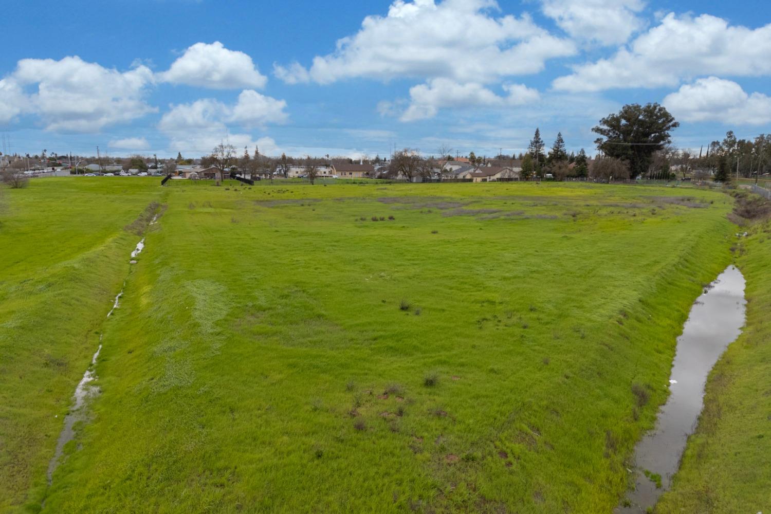 6451 Elder Creek Road Sacramento, CA 95824 - Photo 12 of 21 a view of an ocean and a houses