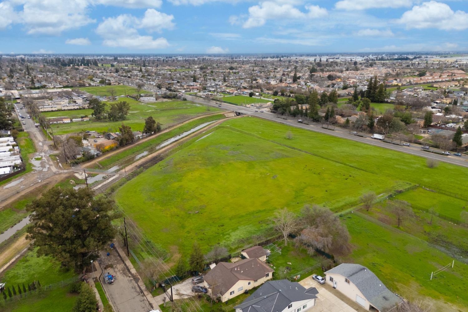 6451 Elder Creek Road Sacramento, CA 95824 - Photo 5 of 21 an aerial view of residential houses with outdoor space
