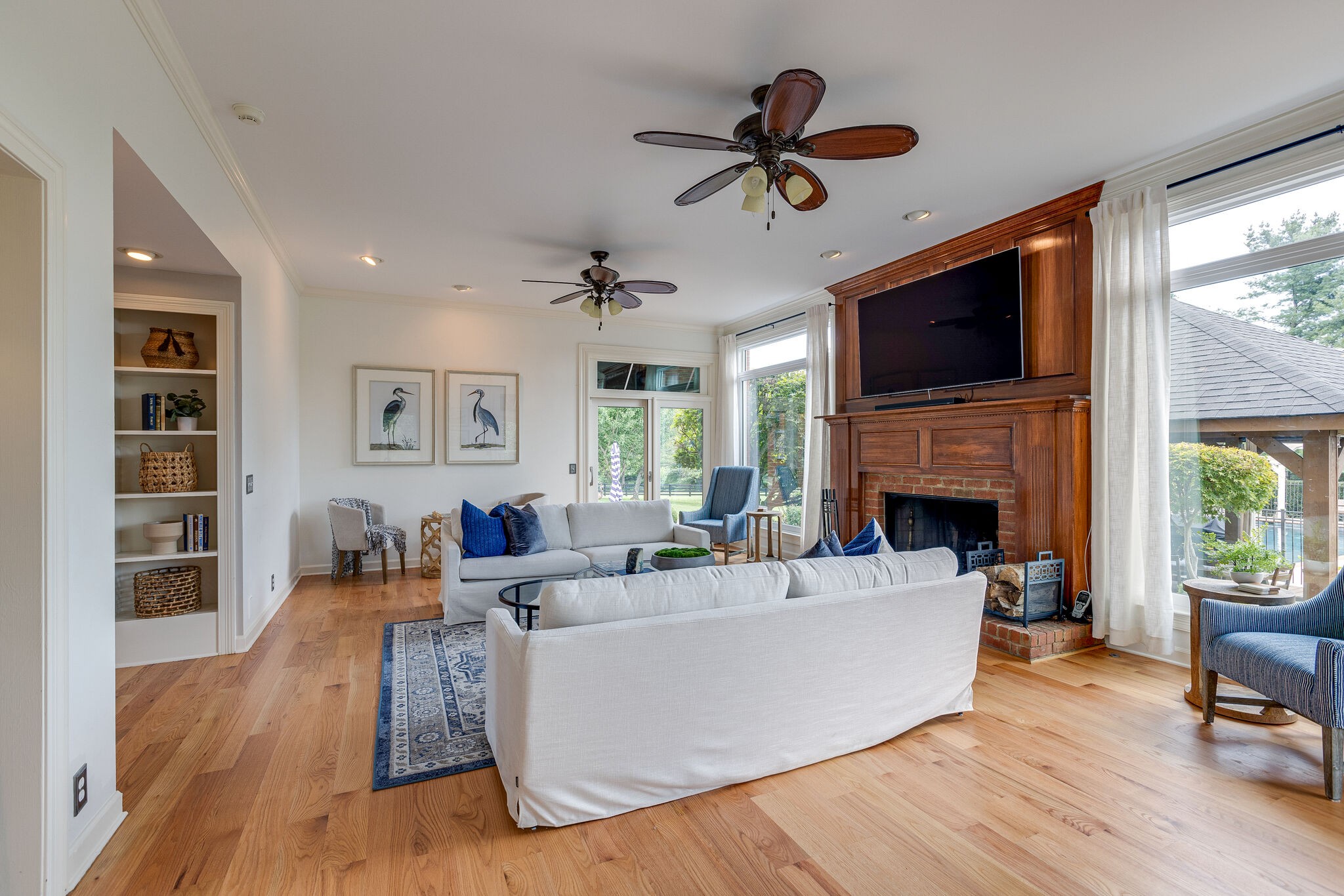 9501 Clovercroft Road Franklin, TN 37067 - Photo 17 of 70 a living room with furniture fireplace and a flat screen tv