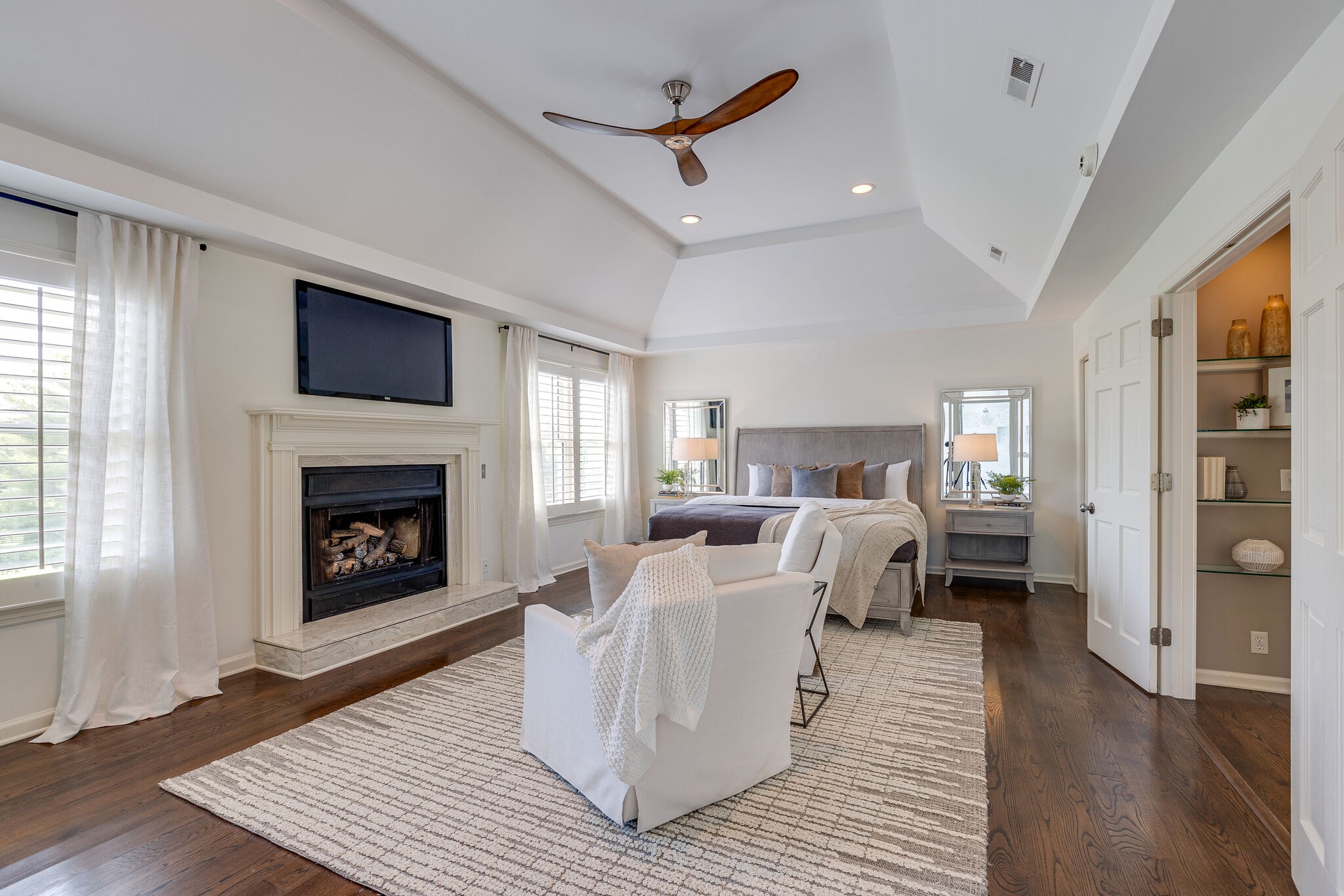 9501 Clovercroft Road Franklin, TN 37067 - Photo 35 of 70 a bed room with bed and a fireplace