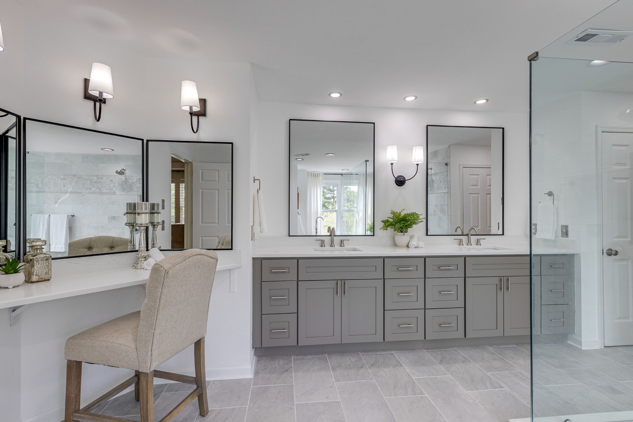 9501 Clovercroft Road Franklin, TN 37067 - Photo 41 of 70 a spacious bathroom with a granite countertop sink a mirror and a