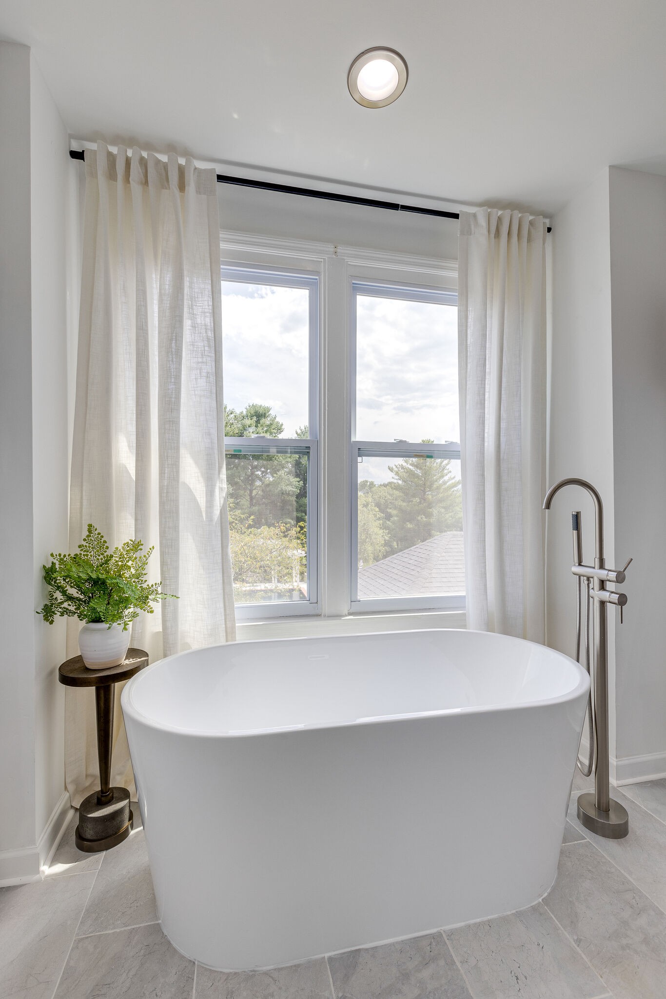 9501 Clovercroft Road Franklin, TN 37067 - Photo 43 of 70 a bathroom with a bathtub and sink