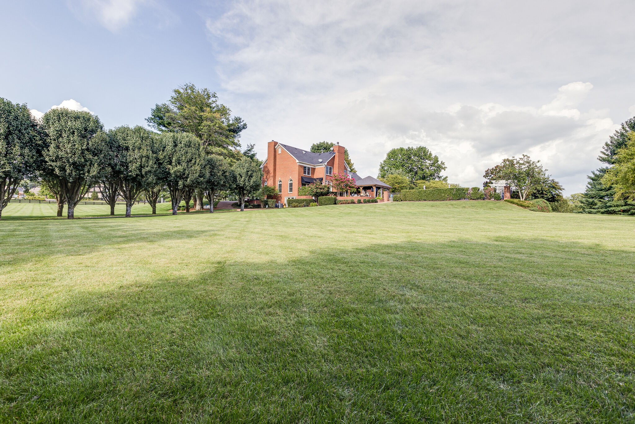 9501 Clovercroft Road Franklin, TN 37067 - Photo 69 of 70 a view of a field with an trees in front of it