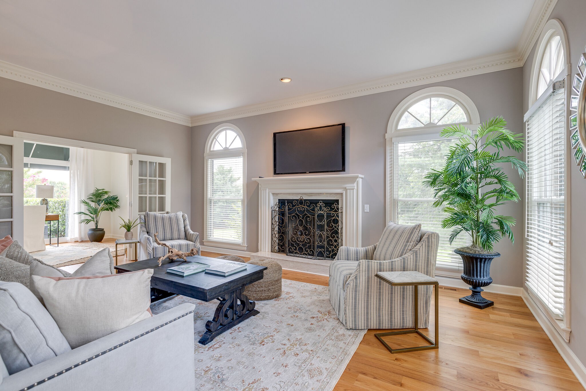 9501 Clovercroft Road Franklin, TN 37067 - Photo 8 of 70 a living room with furniture fireplace and a potted plant