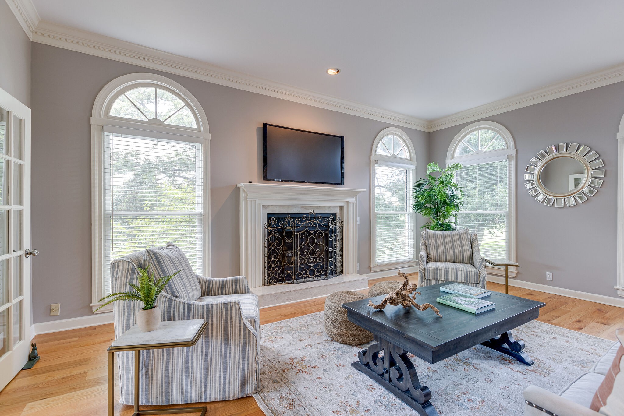 9501 Clovercroft Road Franklin, TN 37067 - Photo 10 of 70 a living room with furniture a fireplace and a large window