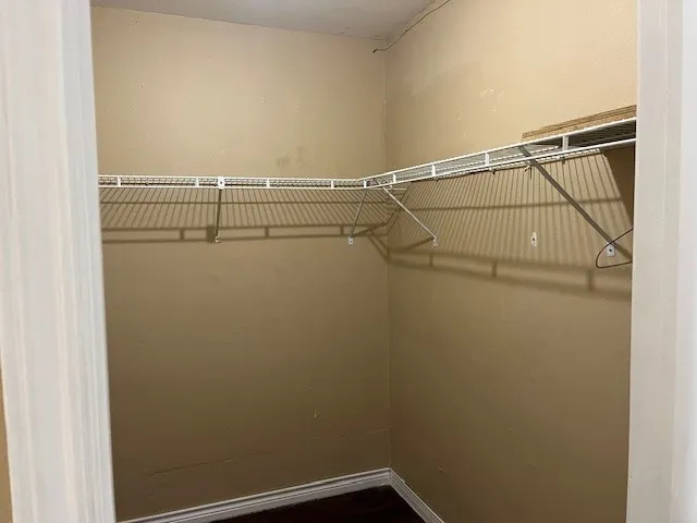 a view of a room with racks on the wall