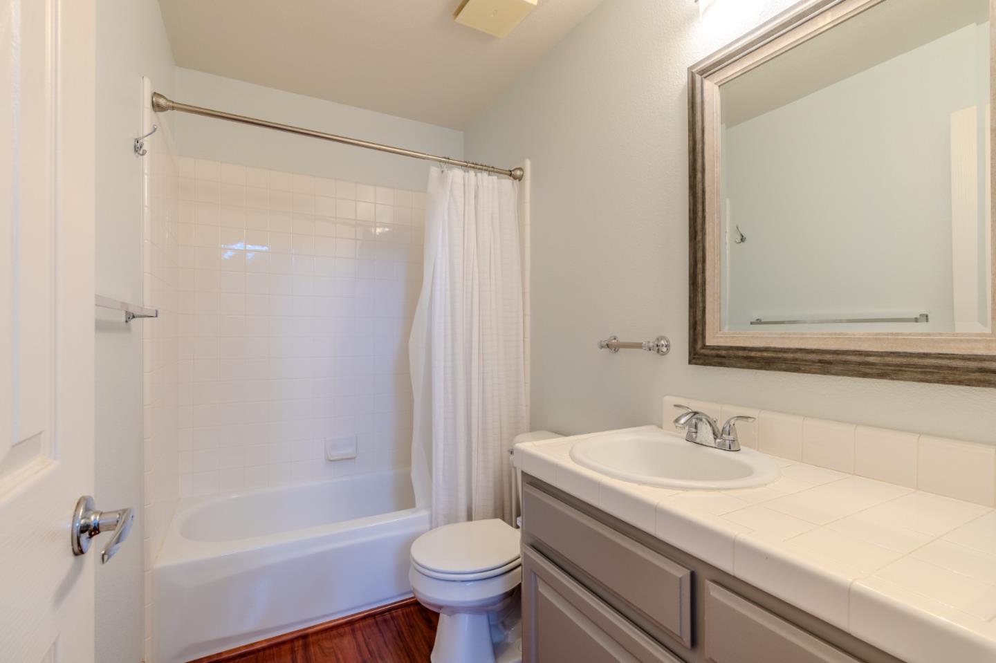 132 Patrick Way Half Moon Bay, CA 94019 - Photo 19 of 29 a bathroom with a sink toilet and shower