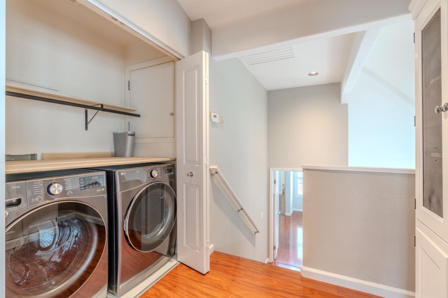 132 Patrick Way Half Moon Bay, CA 94019 - Photo 20 of 29 a view of a hallway with washer and dryer