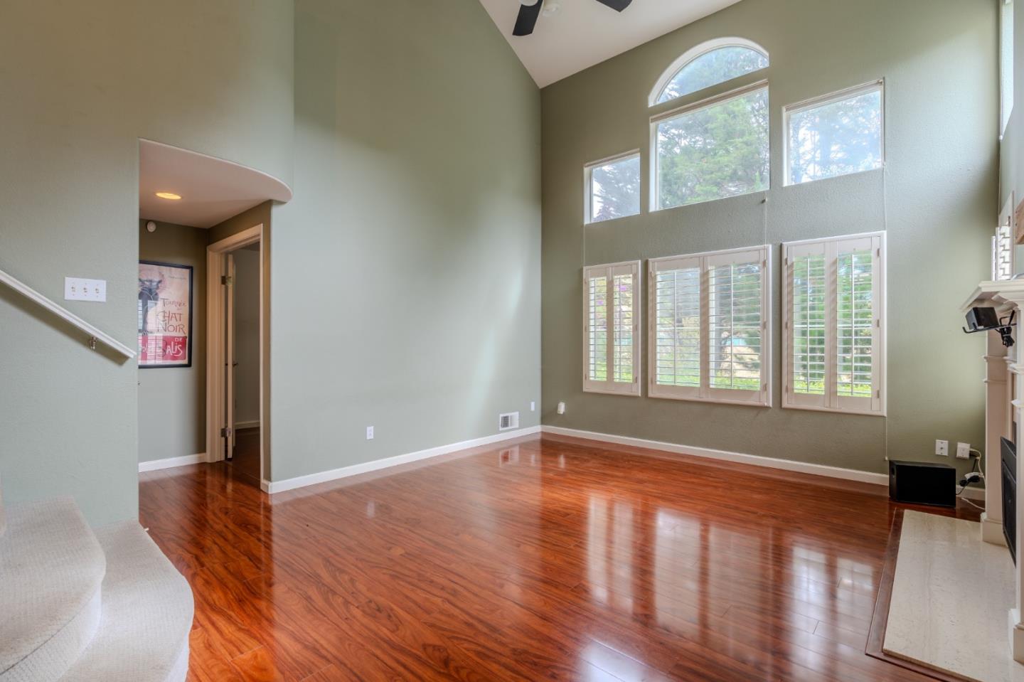 132 Patrick Way Half Moon Bay, CA 94019 - Photo 2 of 29 a view of an empty room with wooden floor and a window