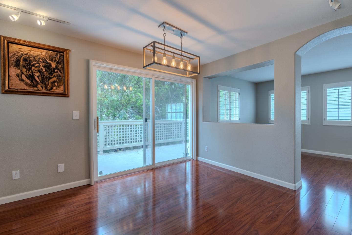 132 Patrick Way Half Moon Bay, CA 94019 - Photo 10 of 29 a view of an empty room with wooden floor and a window