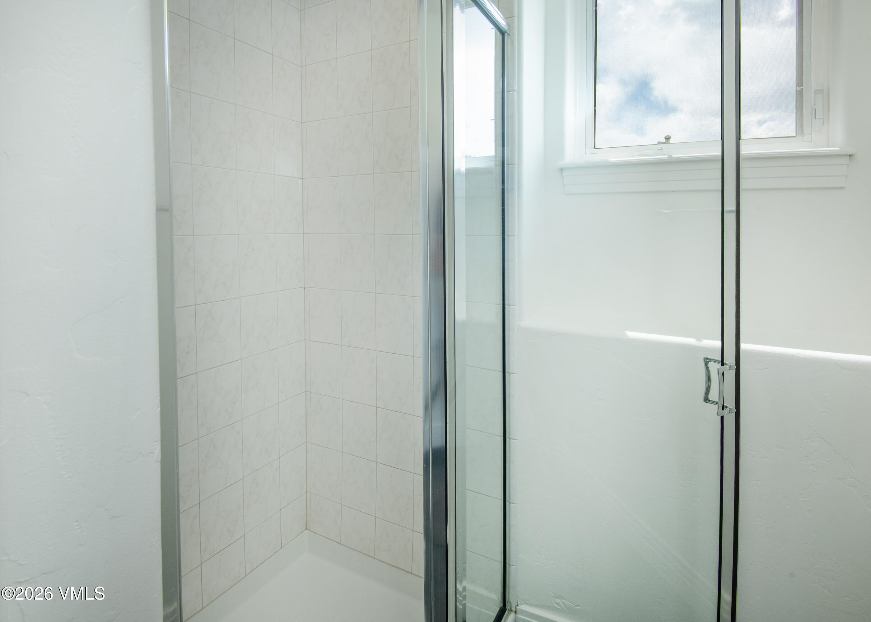 471 Rawhide Road Edwards, CO 81632 - Photo 41 of 51 a bathroom with a glass shower door