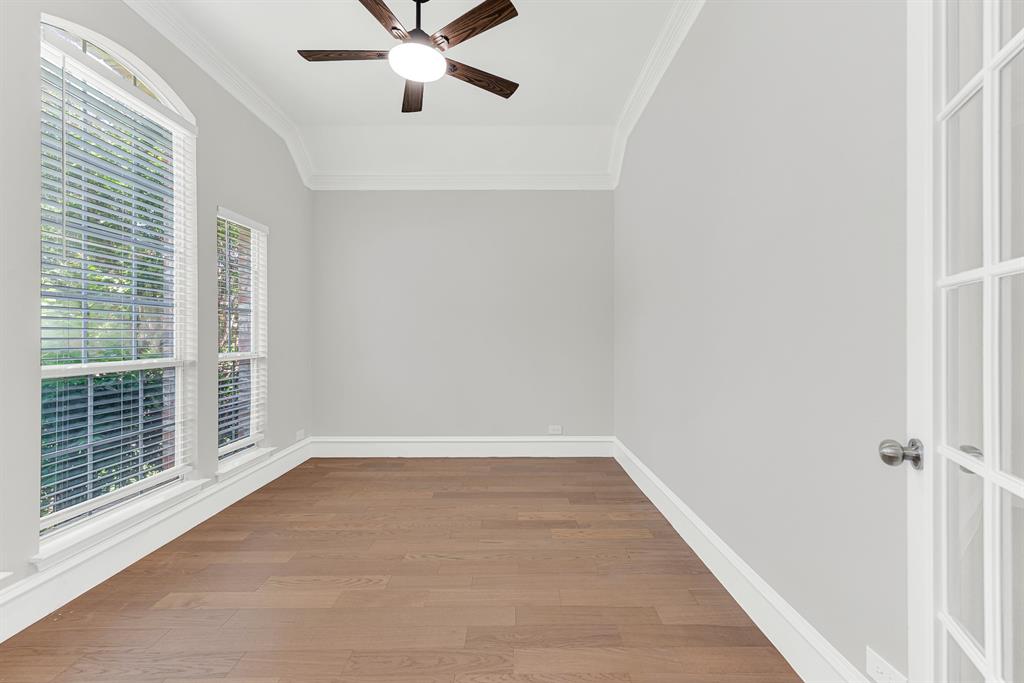 3500 Neiman Road Plano, TX 75025 - Photo 10 of 26 A charming room at the front of the home is flexible! Could be a formal living room, sitting room or a home office! More crown molding along the walls and durable laminate flooring