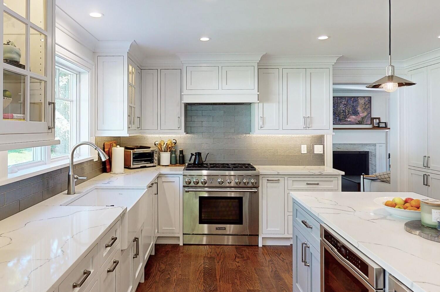 2 Hollow Tree Ridge Road Darien, CT 06820 - Photo 12 of 40 a kitchen with a stove sink and cabinets