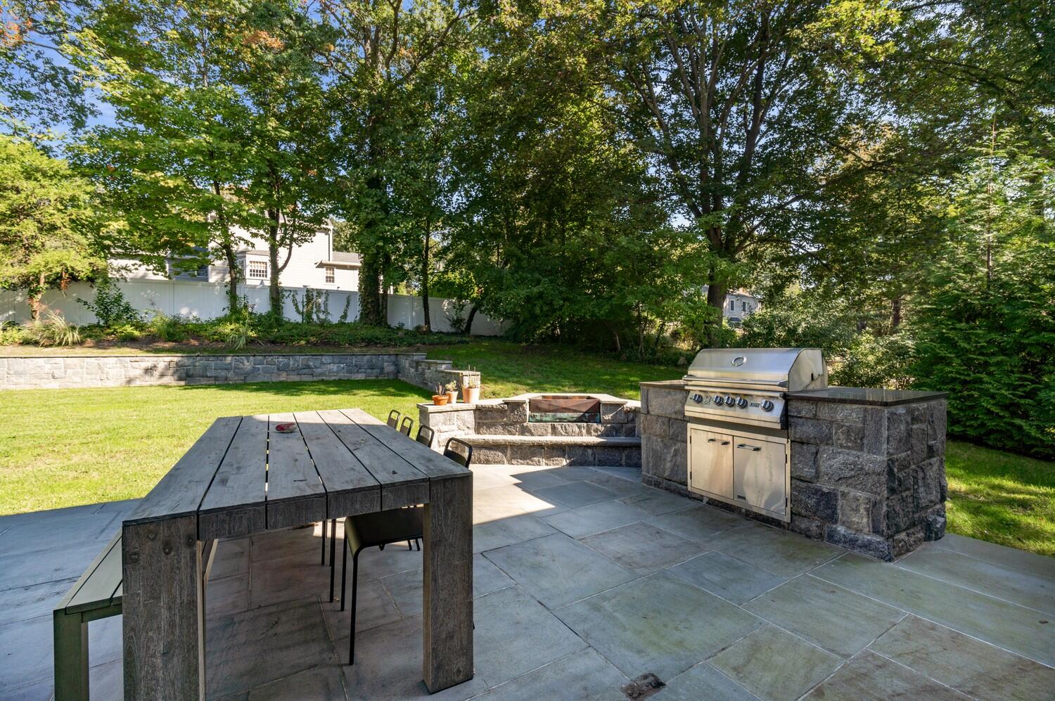 2 Hollow Tree Ridge Road Darien, CT 06820 - Photo 3 of 40 a view of a swimming pool with a patio