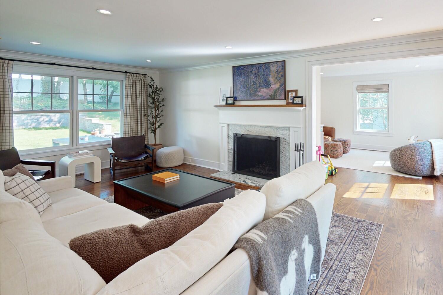 2 Hollow Tree Ridge Road Darien, CT 06820 - Photo 7 of 40 a living room with furniture and a fireplace