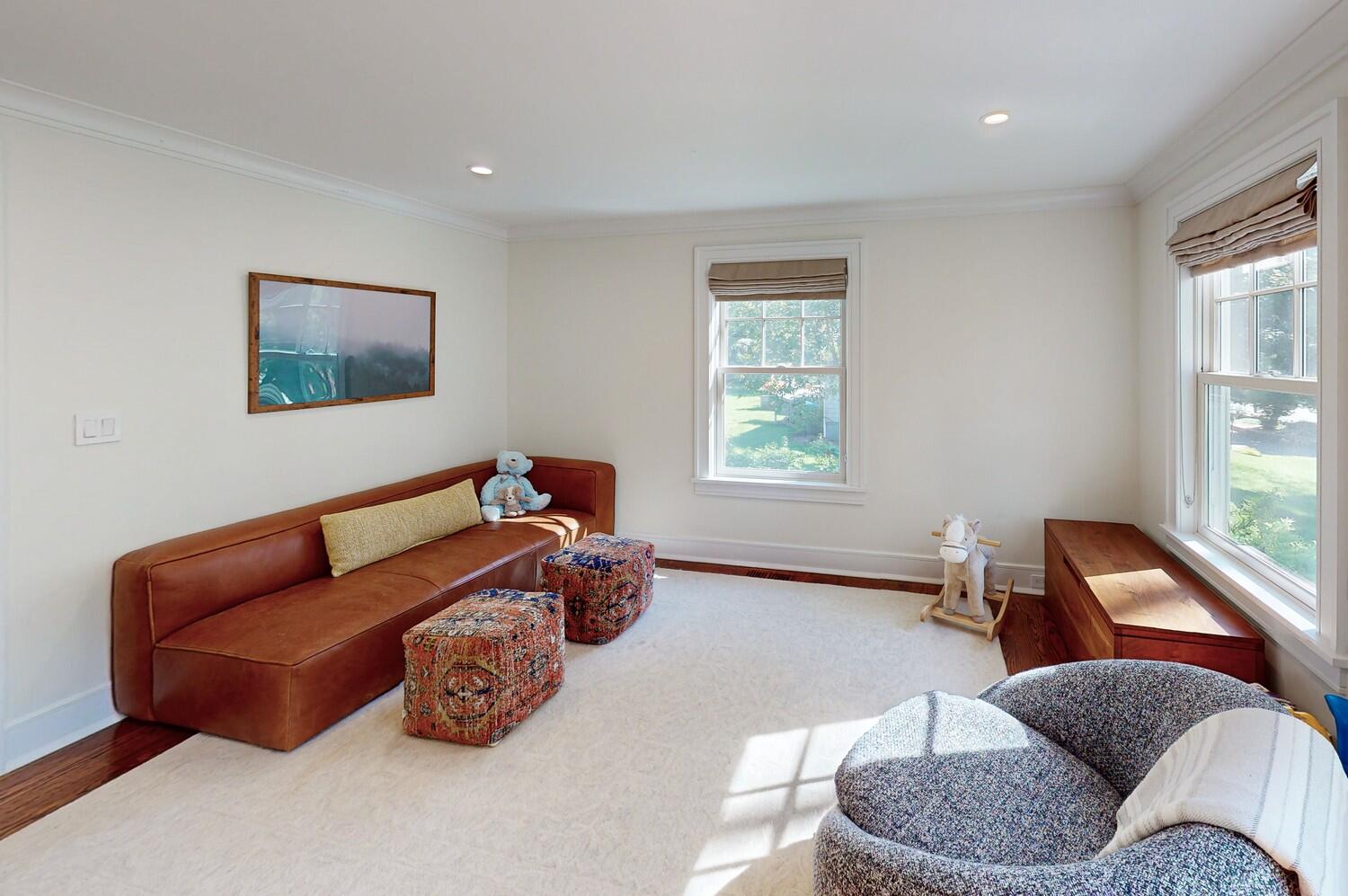 2 Hollow Tree Ridge Road Darien, CT 06820 - Photo 8 of 40 a living room with furniture and a window
