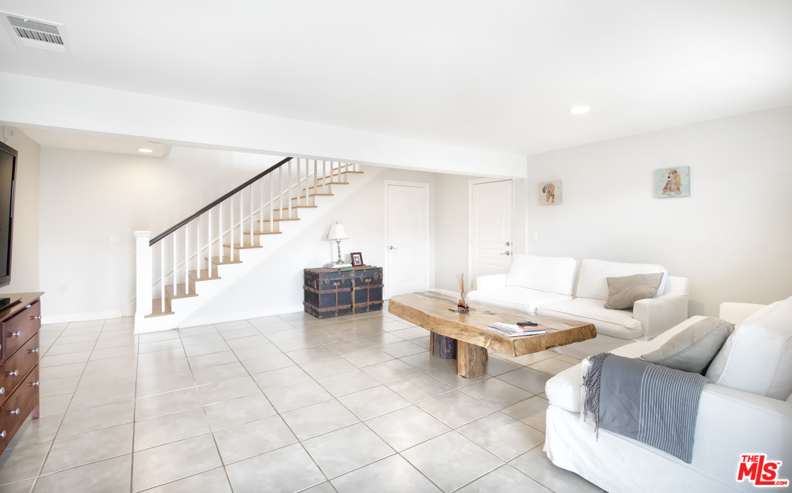 26258 Fairside Road Malibu, CA 90265 - Photo 14 of 46 a living room with furniture and white walls