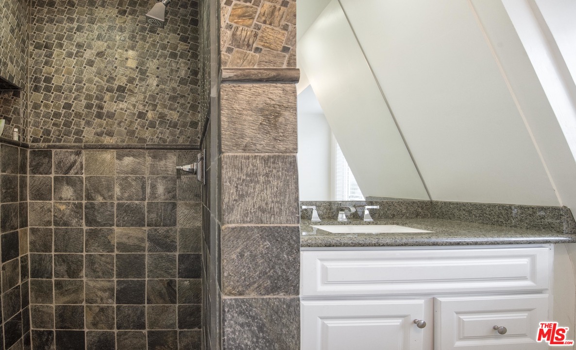 26258 Fairside Road Malibu, CA 90265 - Photo 29 of 46 a bathroom with a sink and a mirror