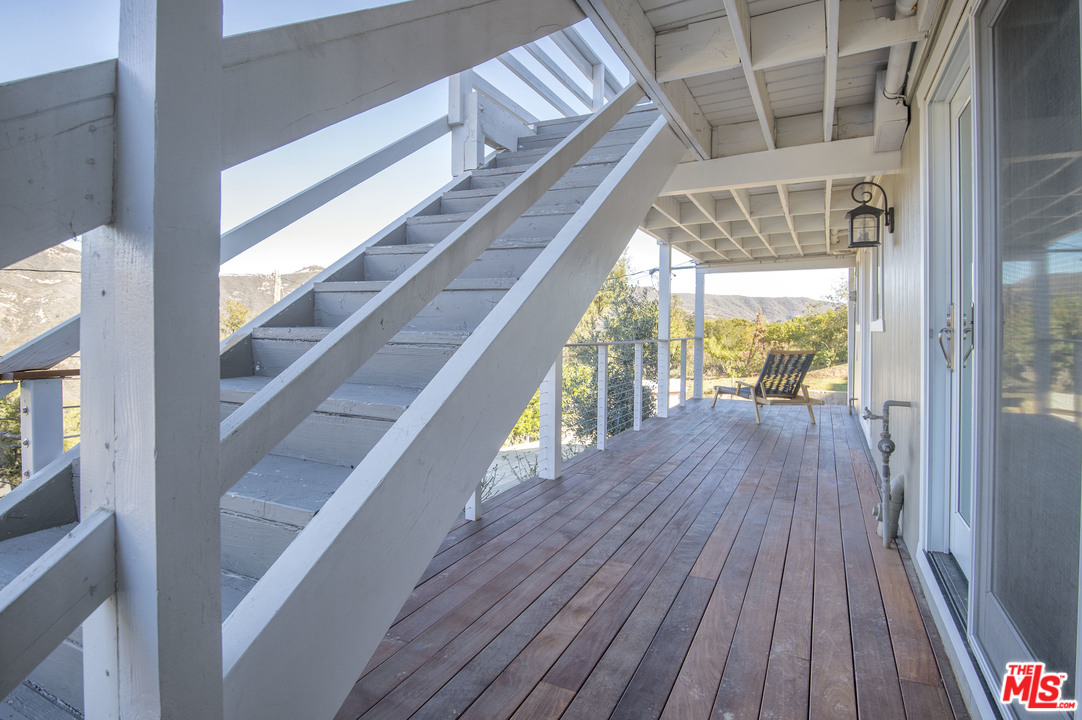 26258 Fairside Road Malibu, CA 90265 - Photo 30 of 46 a view of balcony with wooden floor