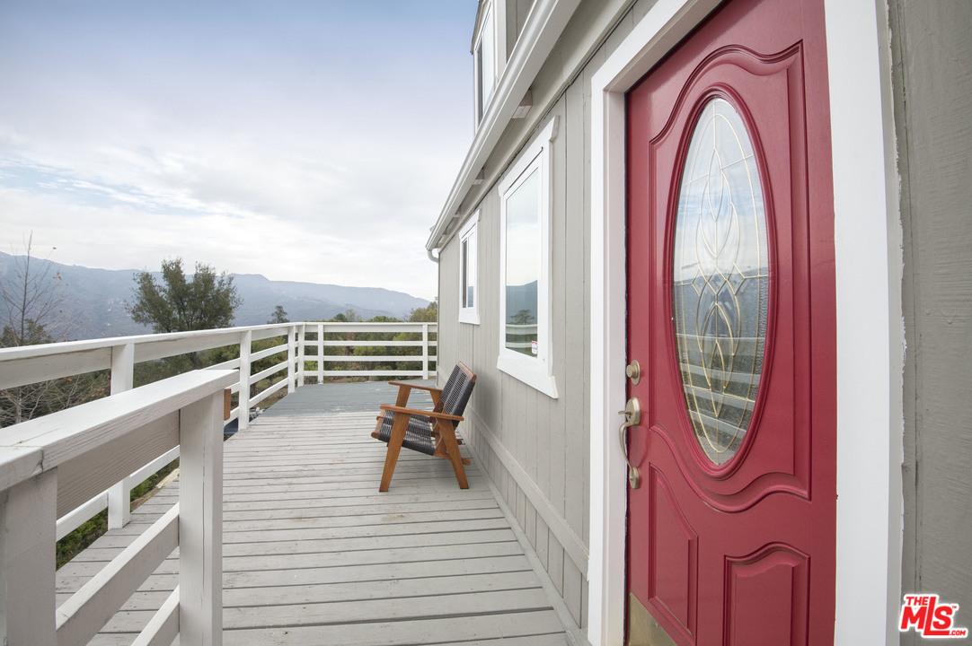 26258 Fairside Road Malibu, CA 90265 - Photo 33 of 46 a view of roof deck with furniture and a potted plant
