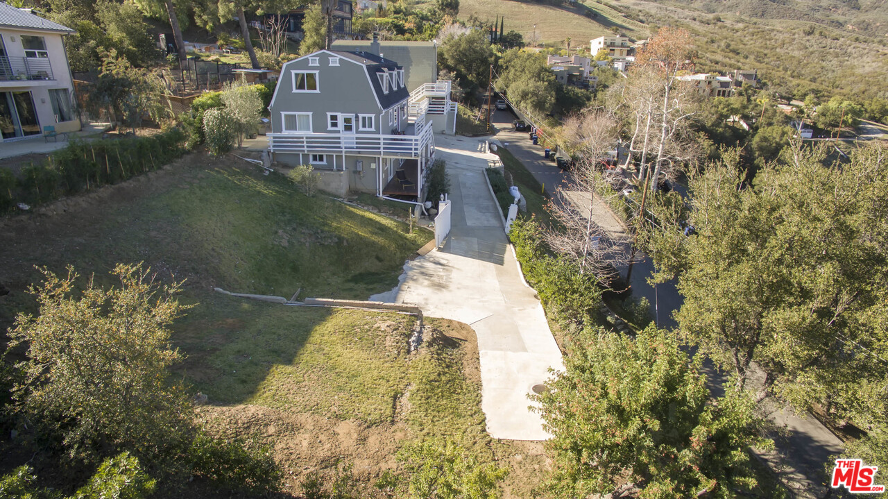 26258 Fairside Road Malibu, CA 90265 - Photo 43 of 46 a view of a house with a yard
