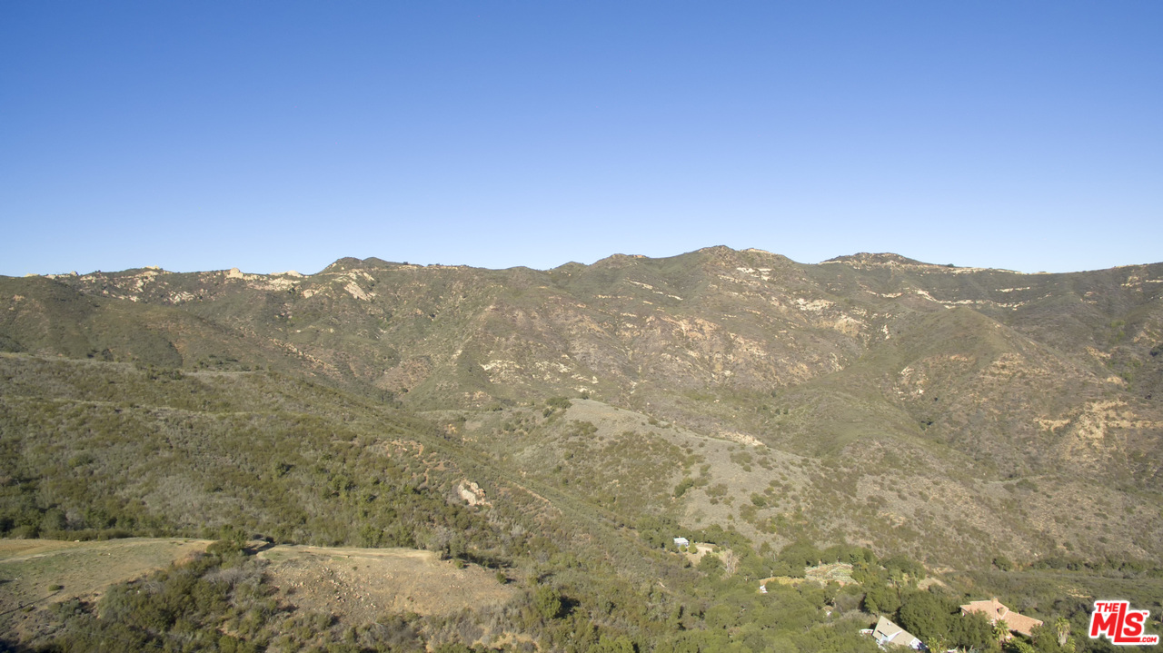 26258 Fairside Road Malibu, CA 90265 - Photo 45 of 46 a view of a mountain range in a cloudy sky