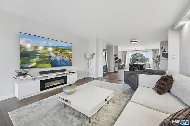 a view of a dining room with furniture and window