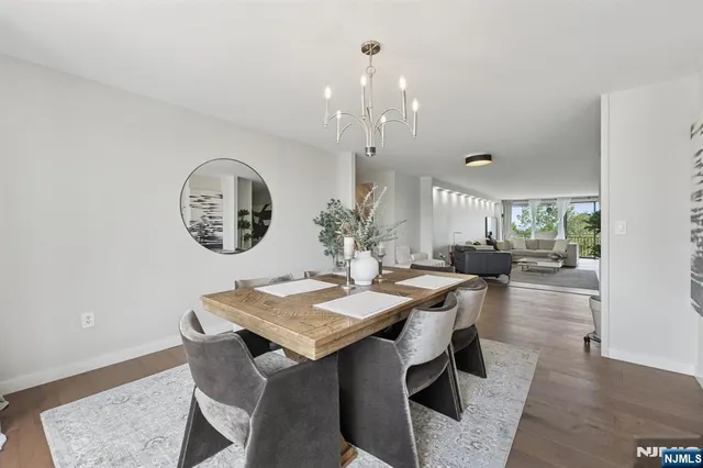 a kitchen with a stove a sink and a window