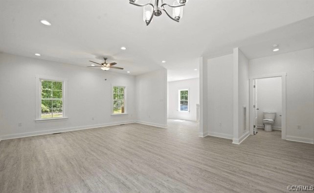 13985 Cross County Road Mineral, VA 23117 - Photo 12 of 27 a view of an empty room with wooden floor and a window