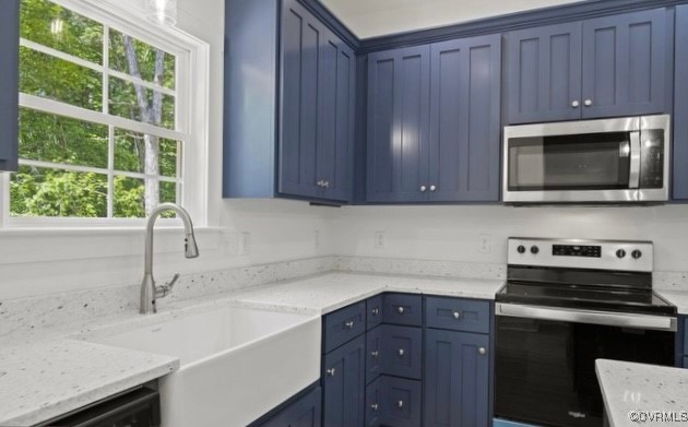 13985 Cross County Road Mineral, VA 23117 - Photo 5 of 27 a kitchen with a sink cabinets and microwave