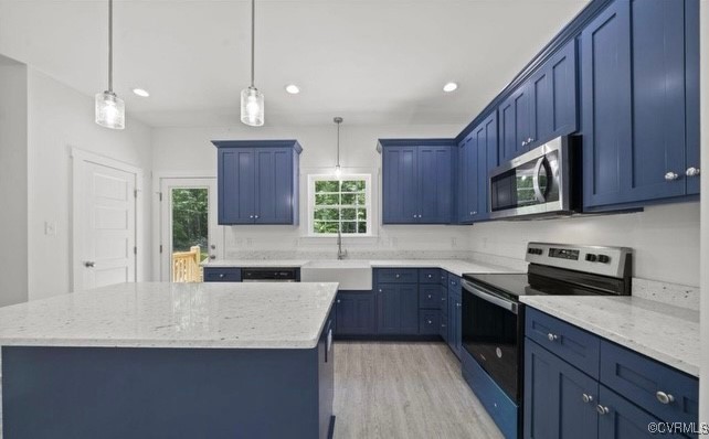 13985 Cross County Road Mineral, VA 23117 - Photo 9 of 27 a kitchen with stainless steel appliances granite countertop wooden cabinets a stove a sink and a oven