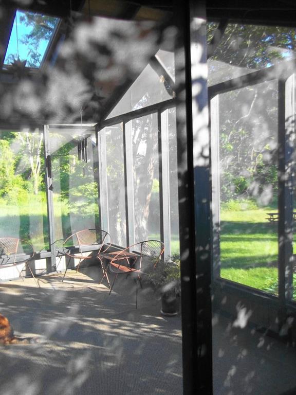 125 Nelson Road Pittston, ME 04345 - Photo 14 of 34 Screened in Porch with skylights...