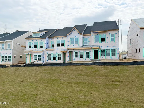 a front view of building with ocean view