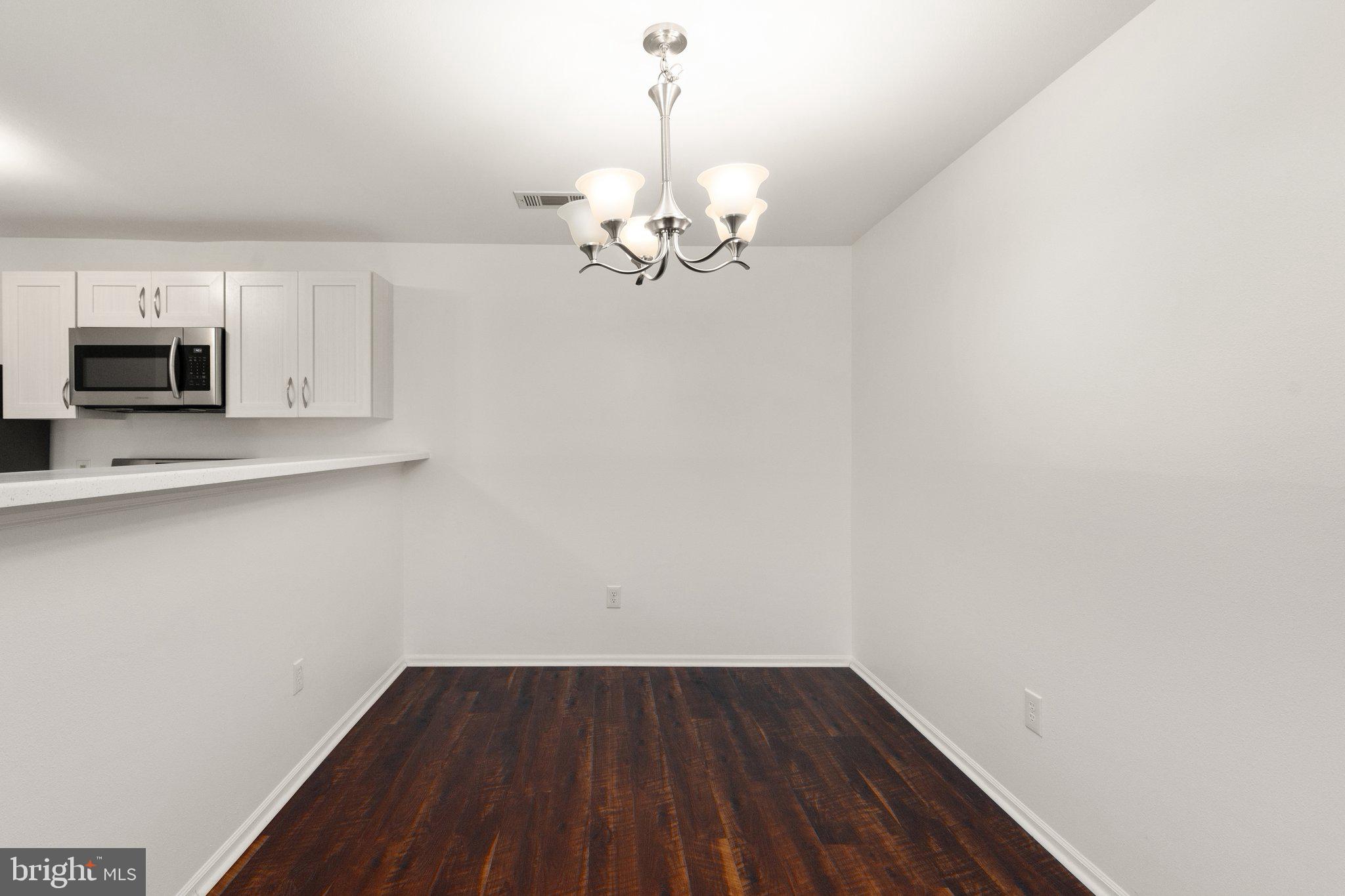 608 Churchill Road, Unit L Bel Air, MD 21014 - Photo 11 of 23 Dining Room looking into Kitchen