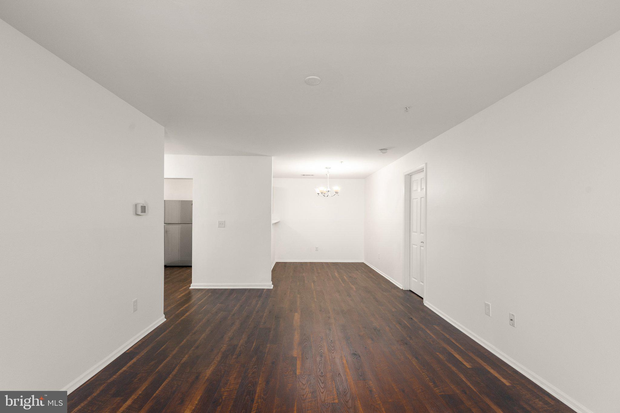 608 Churchill Road, Unit L Bel Air, MD 21014 - Photo 10 of 23 Living Room looking into the Dining Room