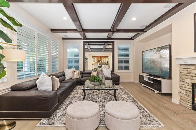 a kitchen with granite countertop kitchen island a sink appliances and cabinets