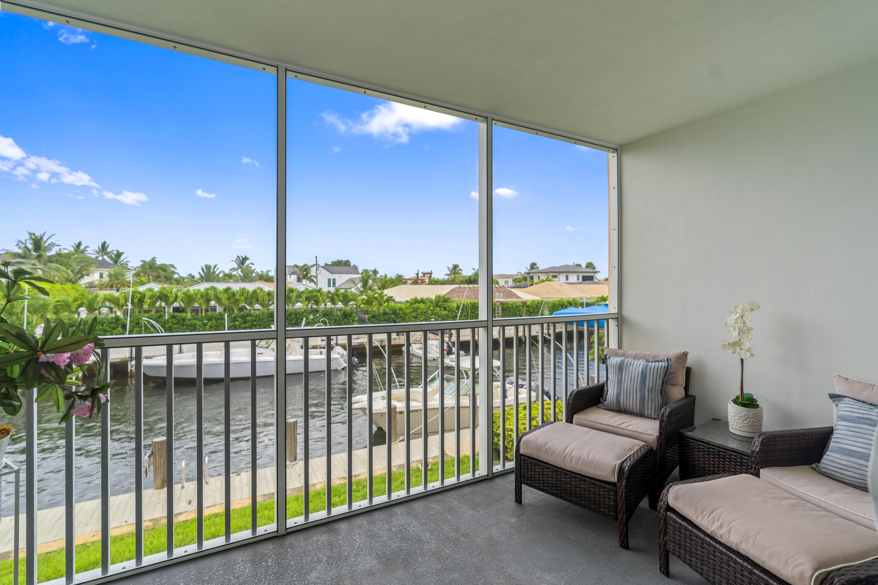 750 Northeast Spanish River Boulevard, Unit 2040 Boca Raton, FL 33431 - Photo 1 of 40 a balcony with couch