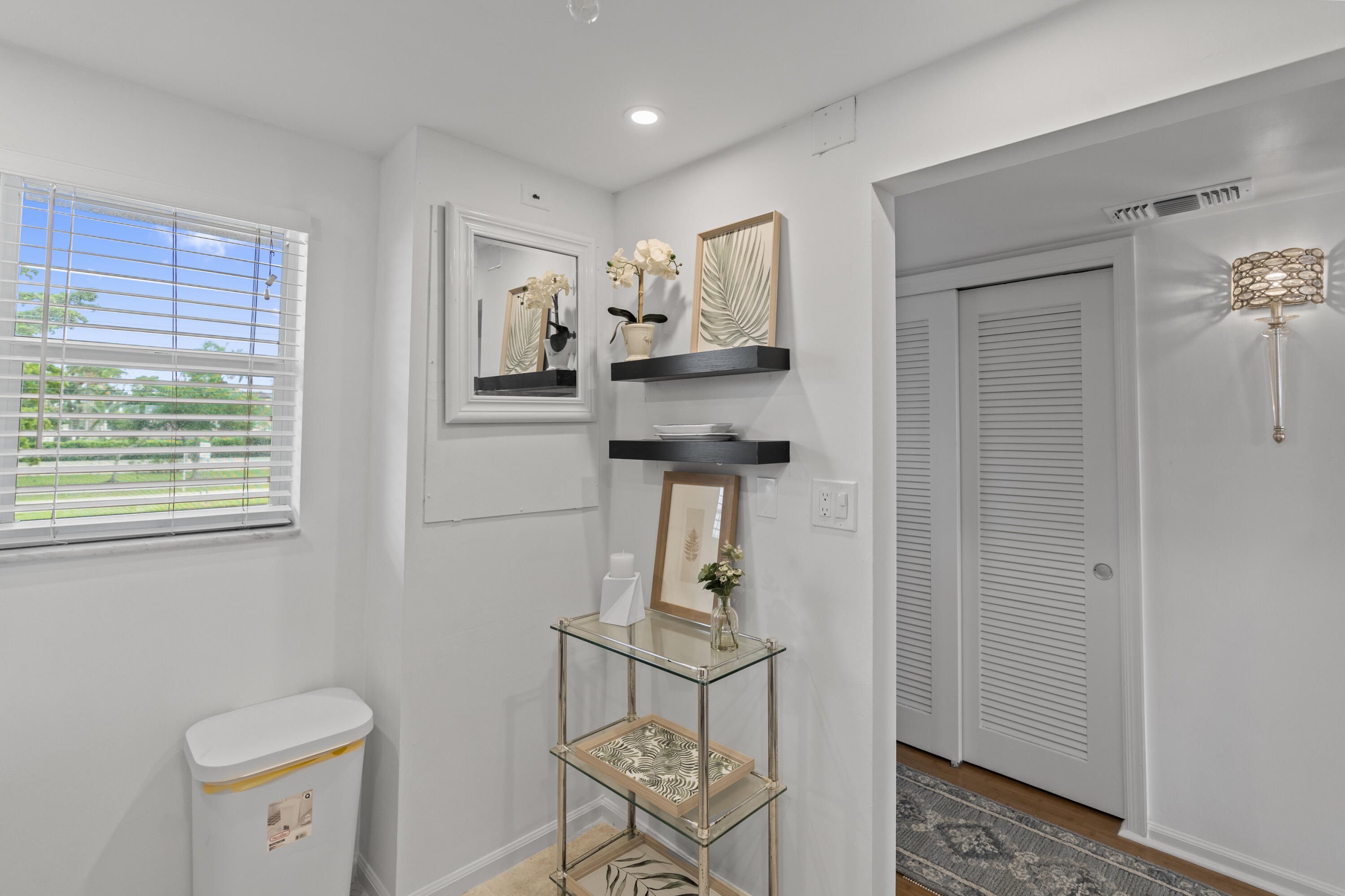 750 Northeast Spanish River Boulevard, Unit 2040 Boca Raton, FL 33431 - Photo 20 of 40 a view of a hallway with bathroom