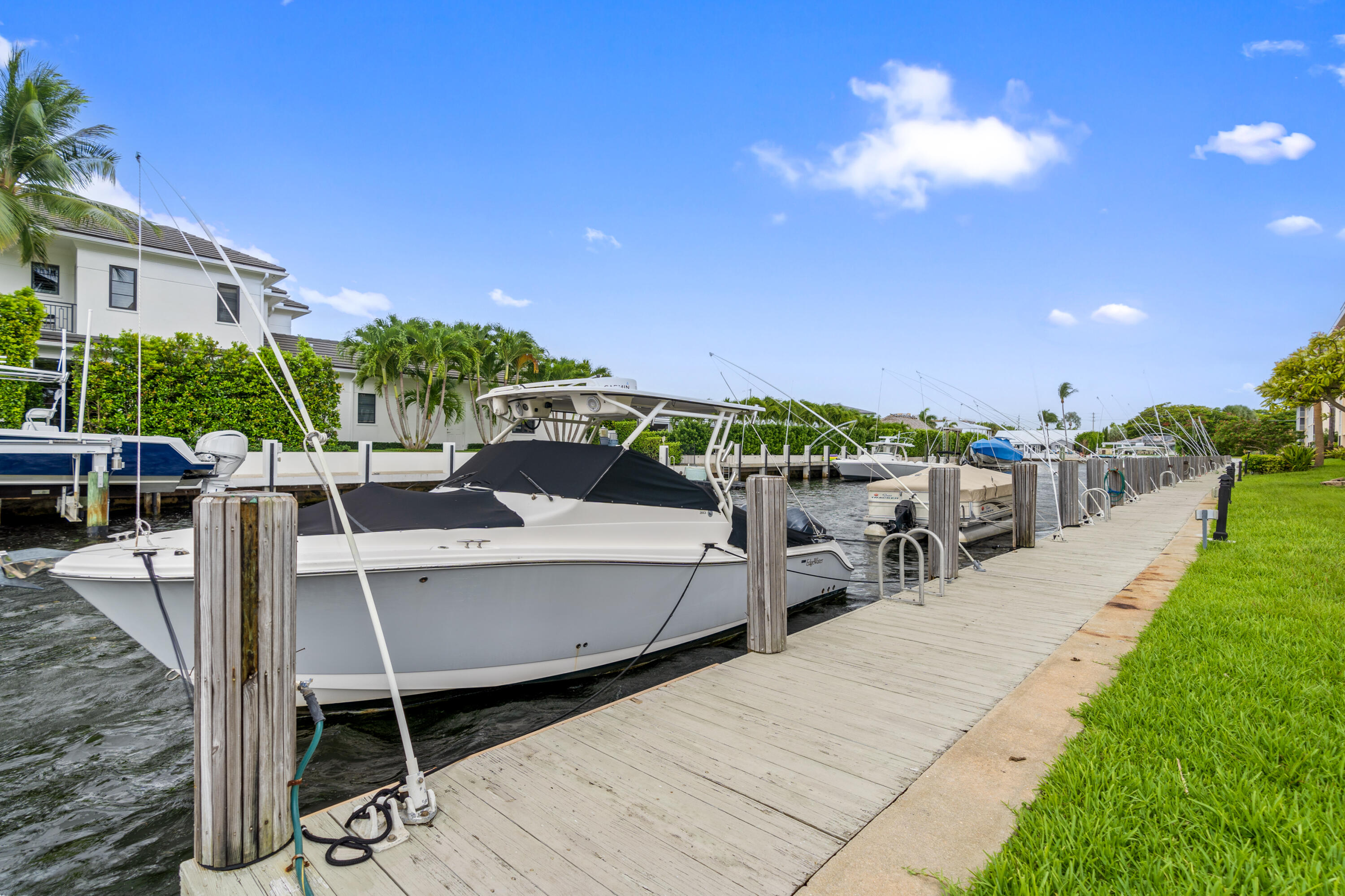 750 Northeast Spanish River Boulevard, Unit 2040 Boca Raton, FL 33431 - Photo 34 of 40 a view of a patio with swimming pool