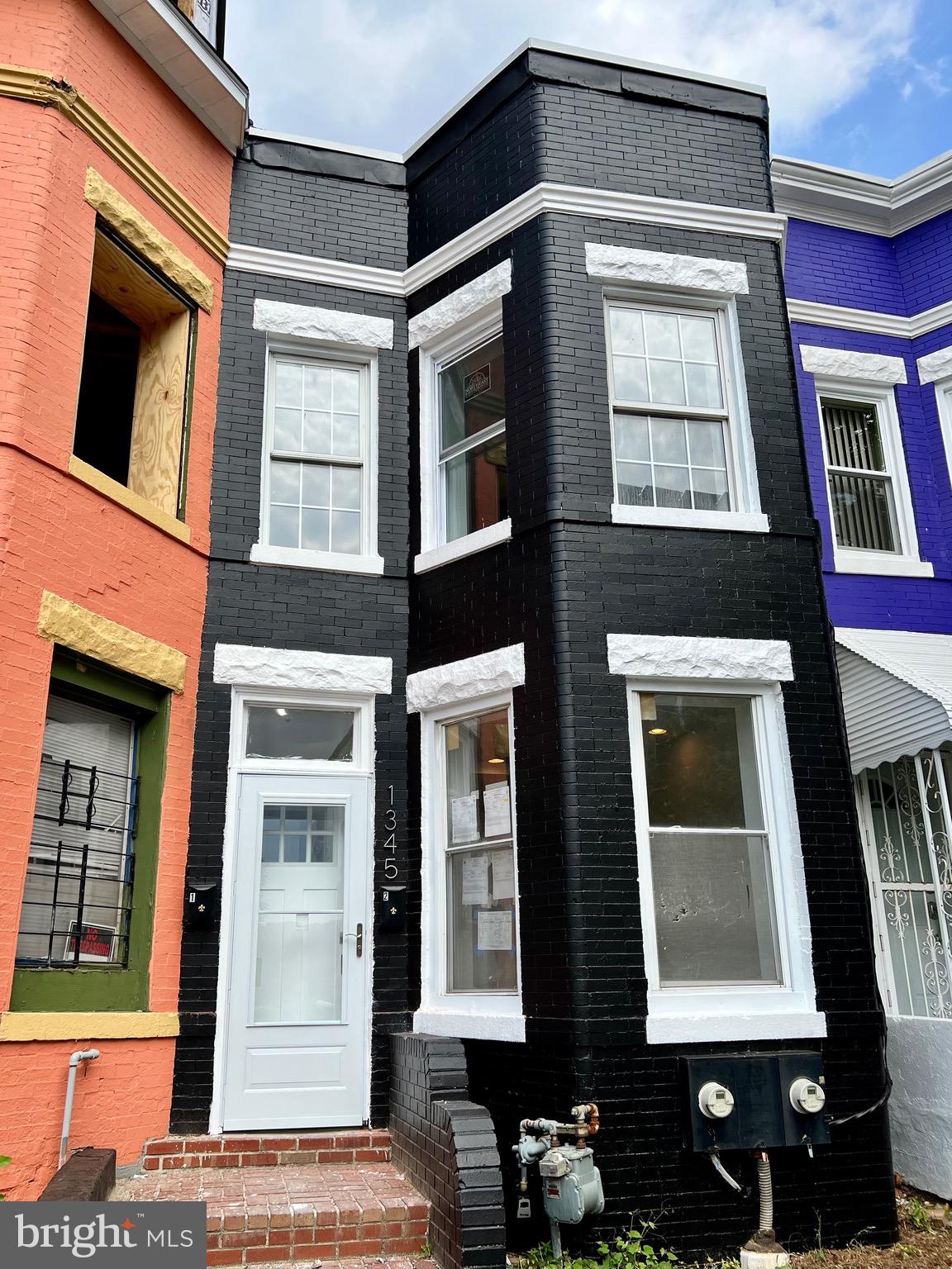 1345 1st Street Northwest, Unit 2 Washington, DC 20001 - Photo 1 of 19 a front view of a house