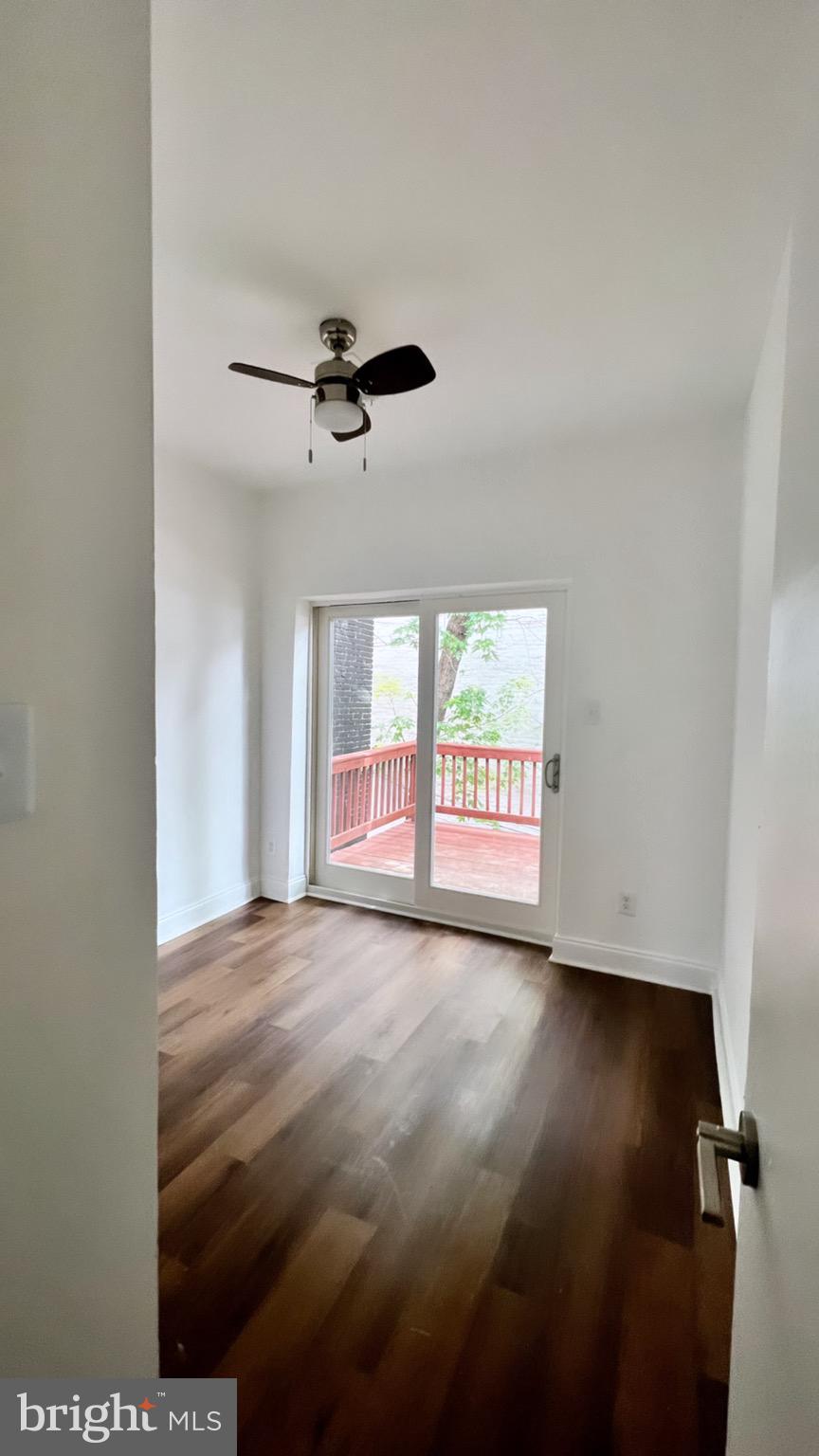 1345 1st Street Northwest, Unit 2 Washington, DC 20001 - Photo 14 of 19 a view of an empty room with a window
