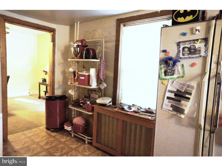 6016 West Thompson Street Philadelphia, PA 19151 - Photo 8 of 17 a room with furniture and a window