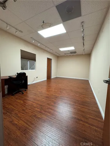 a view of livingroom with furniture and wooden floor