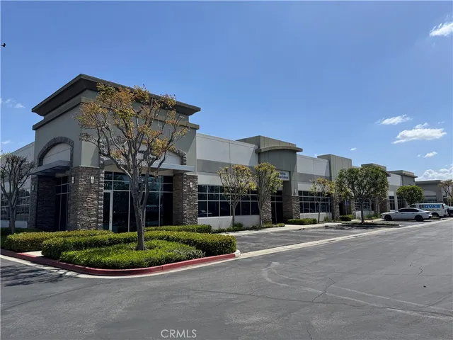 a view of a building with a street