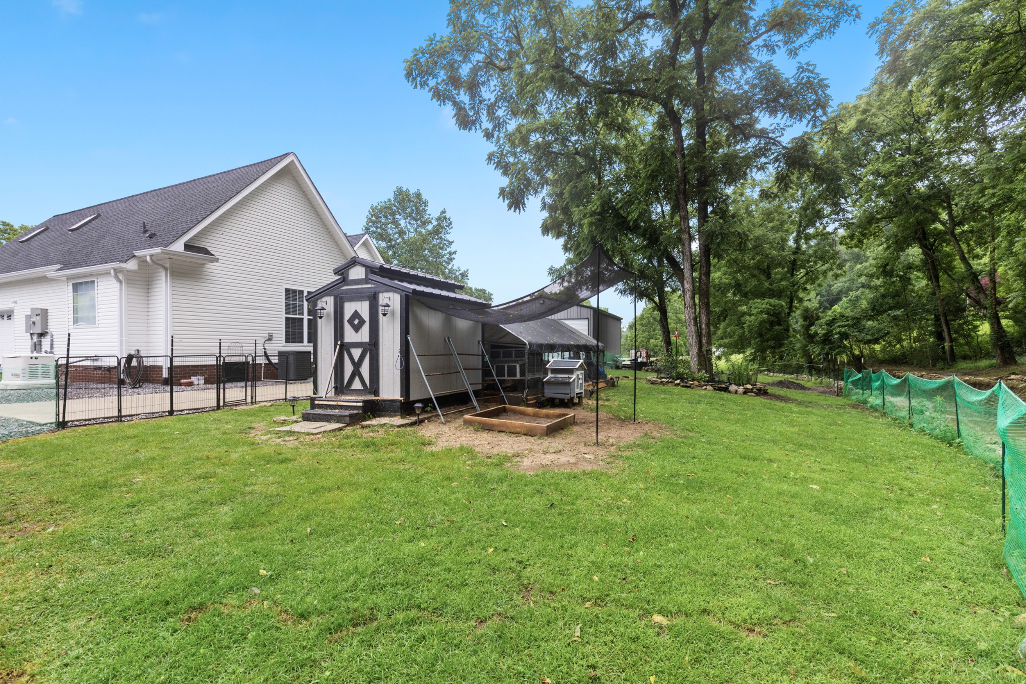 454 Campbell Hollow Road Bethpage, TN 37022 - Photo 47 of 57 a view of a house with a yard and sitting area