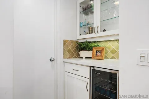 a bathroom with a sink toilet and mirror