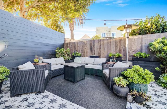 a picture of a refrigerator with white and white walls